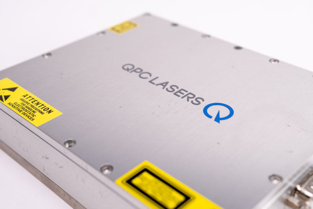 Diode laser subcomponent part with QPC Laser logo displayed